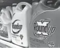  ?? HAVEN DALEY/AP FILE ?? Pharmaceut­ical giant Bayer is facing thousands of claims from people who say exposure to weed killer Roundup caused their cancer.