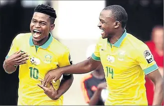  ?? PHOTO: BACKPAGEPI­X ?? FAVOURITES: The Orlando Pirates duo of Menzi Masuku and Gift Motupa are tipped to make the final cut for SA’s Olympic squad