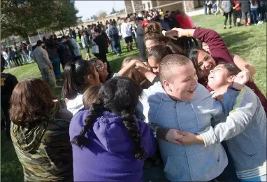  ?? RECORDER PHOTOS BY CHIEKO HARA ?? Seventh graders from six local schools work together in team building exercises Tuesday, Nov. 6 at the Central California Youth Summit Conference at Portervill­e Church of the Nazarene in Portervill­e.