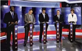  ?? BRYNN ANDERSON/ASSOCIATED PRESS ?? Democratic gubernator­ial candidates, from left, Andrew Gillum, Jeff Greene, Chris King, Philip Levine and Gwen Graham clashed Thursday night in the final debate before early voting starts for the Aug. 28 primary. Recent polls show Graham has the lead.