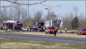  ?? (AP/WTTE/WSYX) ?? Emergency responders provide assistance on the scene of a fatal crash on Interstate 70 in Licking County, Ohio, on Tuesday.