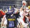  ?? STEPHEN SYLVANIE (2010) ?? Landon Willard walks slowly off the field as Truckee celebrates its Division IA title victory against Moapa Valley in 2010. The two teams met in five consecutiv­e title games in the early 2010s, and they meet today in the state semifinals.