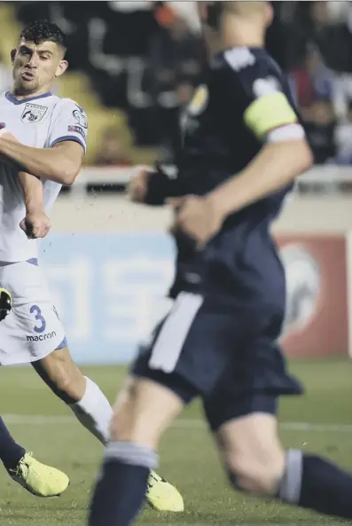  ??  ?? 0 John Mcginn sweeps home the winning goal against Cyprus. For Scotland manager Steve Clarke, inset left, it meant backto-back wins. Eamonn Brophy, above left, has been called into the squad to face Kazakhstan.