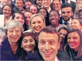 ??  ?? The copycat selfie taken by Emmanuel Macron and posted by Mrs May