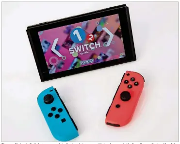  ?? DREW ANGERER / GETTY IMAGES ?? The new Nintendo Switch game console is displayed at a pop-up Nintendo venue in Madison Square Park on March 3 in New York City. The Switch sells for about $300.