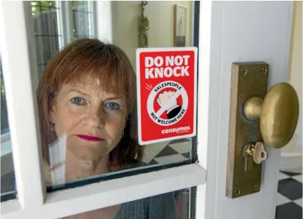  ?? PHOTO: ROSS GIBLIN/FAIRFAX NZ ?? Sue Chetwin says Consumer NZ has handed out half-a-million ‘‘do not knock’’ stickers in a campaign against ‘‘dodgy door-to-door dealers’’.