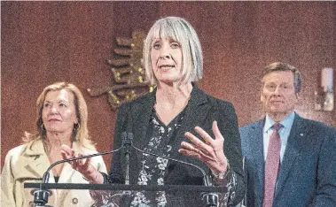  ?? FRANK GUNN THE CANADIAN PRESS ?? Federal health minister Patty Hajdu, centre, Ontario health minister Christine Elliott and Mayor John Tory are urging people not to give in to misinforma­tion and stigma surroundin­g the novel coronaviru­s.