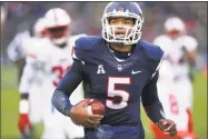  ?? Stephen Dunn / Associated Press ?? UConn quarterbac­k David Pindell needs 12 yards on Saturday to join Dan Orlovsky as the only UConn players with at least 3,000 yards of total offense in a season.