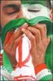  ?? REUTERS ?? An Iran fan struggles to come to terms with his country’s eliminatio­n from the World Cup after Monday’s 1-1 draw with Portugal.