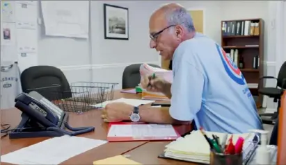  ?? Haddad's Inc. ?? David Haddad, owner of Haddad’s Inc. and chair of the Pennsylvan­ia Film Industry Associatio­n, sits at his desk in this promotiona­l video for his business.