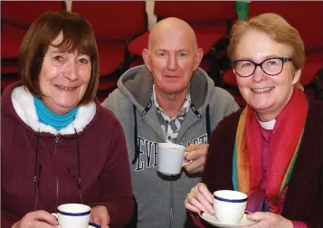  ??  ?? Eva Poole, Neil Thompson and Rev. Kathleen Kehoe enjoying a cuppa at the weekly Wednesday coffee morning at Gorey Methodist Church.