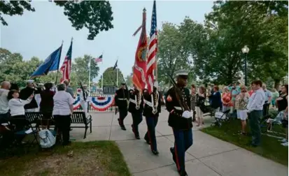  ?? ?? At left, the colors were retired by the 1st Battalion 25th Marines, from Fort Devens.