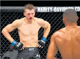  ?? Photo / Getty Images ?? Kiwi fighter Dan Hooker was left bloodied and beaten by Brazil’s Edson Barboza.