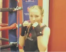  ??  ?? Josie King pictured before her illness, in the gym at Lambton Street Youth Club.