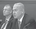  ?? GIL COHEN-MAGEN/POOL, AFP VIA GETTY IMAGES ?? Israeli Prime Minister Benjamin Netanyahu, right, tweeted that “it is important for all of us to work to tone down the rhetoric.”