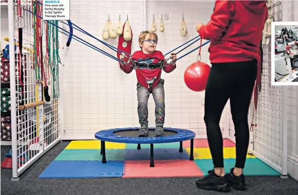  ??  ?? UPWARDLY MOBILE Five-year-old Derby Murphy in the Spider Therapy Room