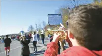  ?? ?? The Parkland High School Trojan Marching Band is getting ready to perform at one of the oldest Thanksgivi­ng parade in the United States.