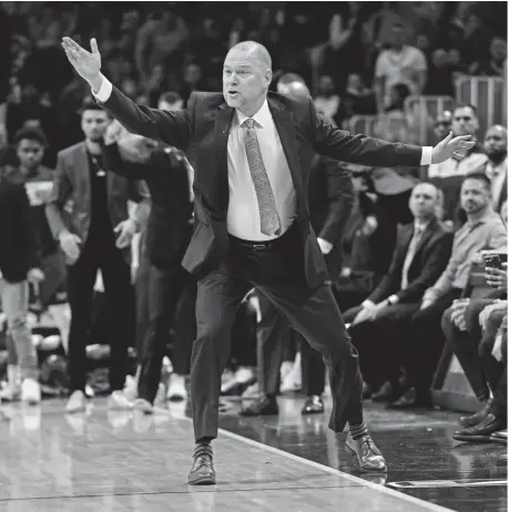  ?? Andy Cross, The Denver Post ?? Nuggets coach Michael Malone gets animated against the Houston Rockets in a game at the Pepsi Center this month. A few games later, he got animated enough that he got ejected — after which Denver rallied to win.