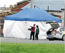  ?? PHOTO: ROBYN EDIE/FAIRFAX NZ ?? A forensic tent set up at the Otepuni Ave address where a shooting took place in Invercargi­ll, on Tuesday night.