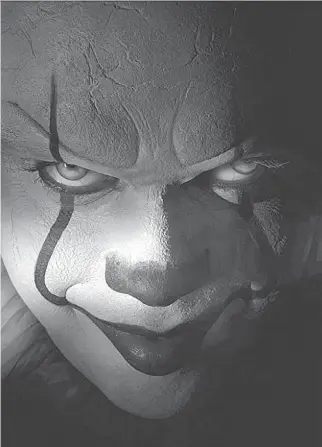  ??  ?? Bill Skarsgård does an admirable job of being creepy as the fearsome monster Pennywise in the new movie It.