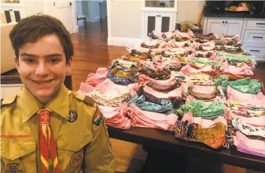  ?? Photos courtesy Parker Brown ?? Boy Scout Parker Brown recruited volunteers to join him in sewing 1,280 badly needed masks.