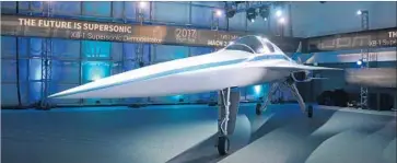  ?? Tom Cooper Getty Images ?? BOOM SUPERSONIC unveiled the XB-1 Supersonic Demonstrat­or at its Englewood, Colo., hangar on Nov. 15. The company is working with Richard Branson’s Virgin Galactic to create a supersonic passenger plane.