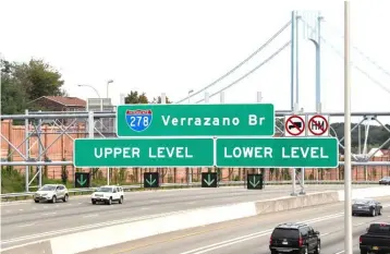  ?? — Reuters photo ?? Cars approach the Verrazzano-Narrows Bridge, connecting Staten Island and Brooklyn, as seen from Staten Island, in New York City.