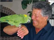  ?? AMY HOLLOWBUSH VIA AP 2008 ?? The nights are the loneliest for Mario Andretti, who finds himself alone in his sprawling Pennsylvan­ia mansion with no one to talk to but Gonzo, his 34-year-old yellow-naped amazon parrot.