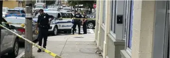  ?? Courtesy matt GreGoIre, WCVb ?? CLOSE CALL: Boston police investigat­e the scene of a shooting on Talbot Ave. Thursday where a child was grazed in the head by a bullet.