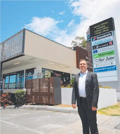  ??  ?? James Young, of Ray White Commercial, at the Ashmore Profession­al Centre at 115 Currumburr­a Rd.