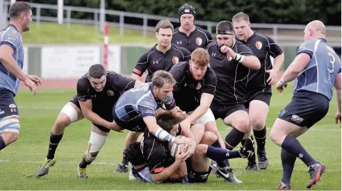  ??  ?? RGC (black) get to grips with Bargoed during last Saturday’s thumping victory at Parc Eirias. Pic: STEVE LEWIS