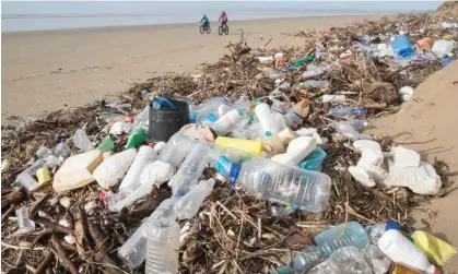  ?? ?? Plastic pollution on a Welsh beach. Volunteers collected and surveyed plastic waste across 84 countries over five years. Photograph: Paul Quayle/Alamy