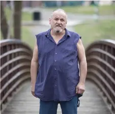  ?? Post by Chris Bergin — Photo for The Washington ?? Sizemore at a park near his home in Indianapol­is. Sizemore’s girlfriend was the first person to die of the covid-19 virus in Indiana.