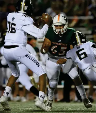  ?? PHOTO FOR THE RECORDER BY DONNIE ZIMMERMAN ?? Marcelus Rodriguez applies pressure against Golden Valley for the Portervill­e High football team on Thursday, September 2, 2021, at Rankin Stadium.