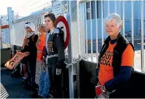  ?? PHOTOS: JOHN BISSET/FAIRFAX NZ ?? Activists including Jeanette Fitzsimons, right, chained themselves to a gate in protest against the use of coal.