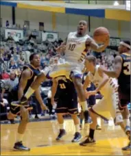  ?? JEFF Couch/sports@saratogian.com ?? UAlbany’s Mike Black ( 10) jumps to the basket in action against Quinnipiac at the SEFCU Arena Friday.