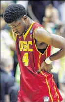  ?? TONY GUTIERREZ / ASSOCIATED PRESS ?? Southern Cal’s Chimezie Metu walks off the court after the Trojans’ 82-78 loss to Baylor.