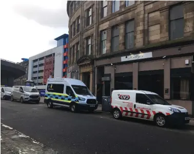  ??  ?? An Immigratio­n Enforcemen­t van was parked up the road from a Home Office raid near the St Enoch Centre