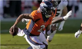  ?? Photograph: David Zalubowski/AP ?? Kendall Hinton completed just one pass for the Broncos after being drafted in as an emergency quarterbac­k.