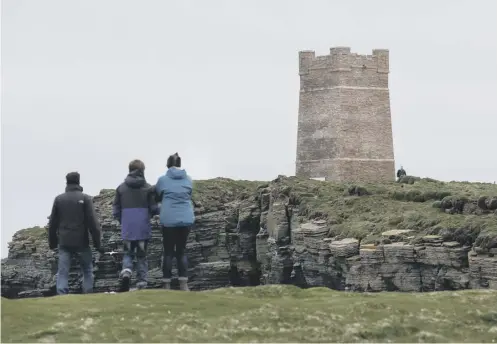  ??  ?? 0 Tourist numbers in Orkney have soared, driven by a boom in cruise ship visits to the islands – one group now wants to tax visitors