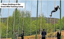  ?? ?? Rope climbing at the Green Mile Training Camp