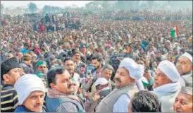  ?? PTI ?? BKU president Naresh Tikait (centre) with other leaders during a Maha Panchayat, organised to mobilise support for the farmers’ agitation at Delhi’s borders in Muzaffarna­gar on Friday.