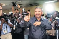  ?? PICTURE: EPA ?? Joao Lourenco, the candidate of the Popular Movement for the Liberation of Angola (MPLA), shows his marked finger after casting his ballot in the general elections at a polling station in Luanda yesterday.