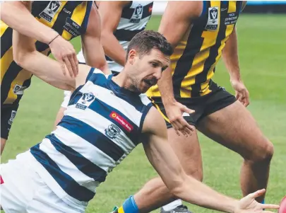  ?? Picture: MARK WILSON ?? HANDS-ON: Geelong forward Aaron Black reaches for the ball.