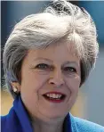  ??  ?? Free trade: Theresa May