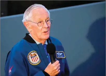  ?? MEG KINNARD / AP ?? Retired NASA astronaut Charlie Duke speaks to a group of middle school students at the South Carolina State Museum on Friday in Columbia, S.C. Duke, 86, is one of four U.S. astronauts still living who walked on the moon during the Apollo program.