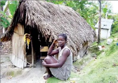  ?? COURTESY PHOTOS
RALPH MATHEY ?? A hut like this is the typical home in the mountainou­s area where Ralph Mathey works near Port Salut, Haiti.