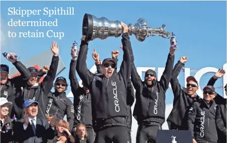  ?? FILE PHOTO BY MARCIO JOSE SANCHEZ, AP ?? Oracle Team USA skipper Jimmy Spithill holds up the Auld Mug after repeating as America’s Cup champion in September 2013.