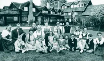  ??  ?? The von Trapps gathered for a reunion at the original Trapp Family Lodge in 1965. Johannes can be seen second from left in the back row