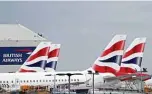  ??  ?? LONDON: British Airways passenger planes are pictured at the apron at London Heathrow Airport in west London. —AFP